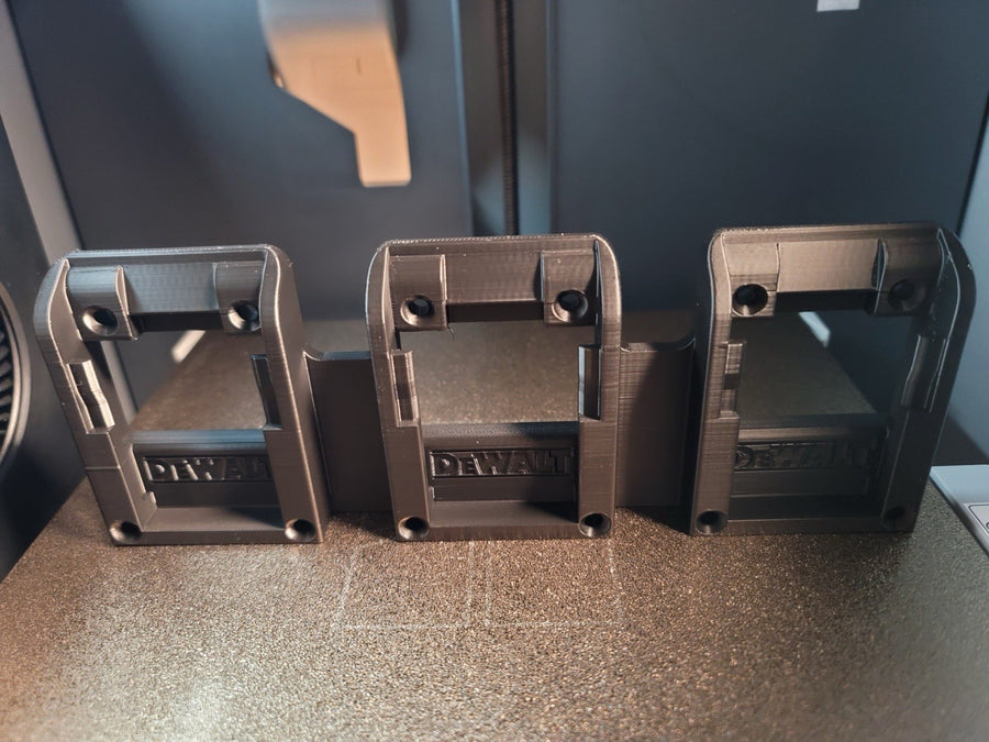 Three-pack wall mount battery holders compatible with DeWalt 20V batteries