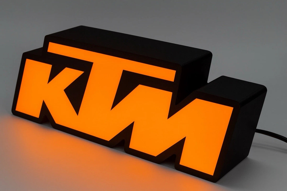 Black and orange KTM inspired USB LED wall sign for motocross garage decor