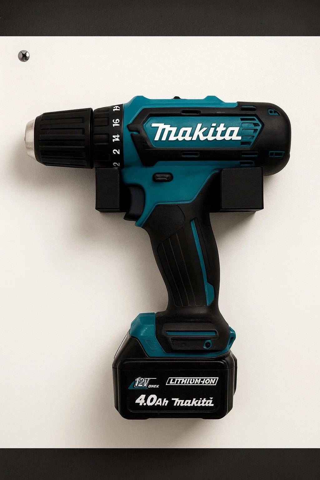 Black wall mount drill holder compatible with Makita 12V and 18V power tools